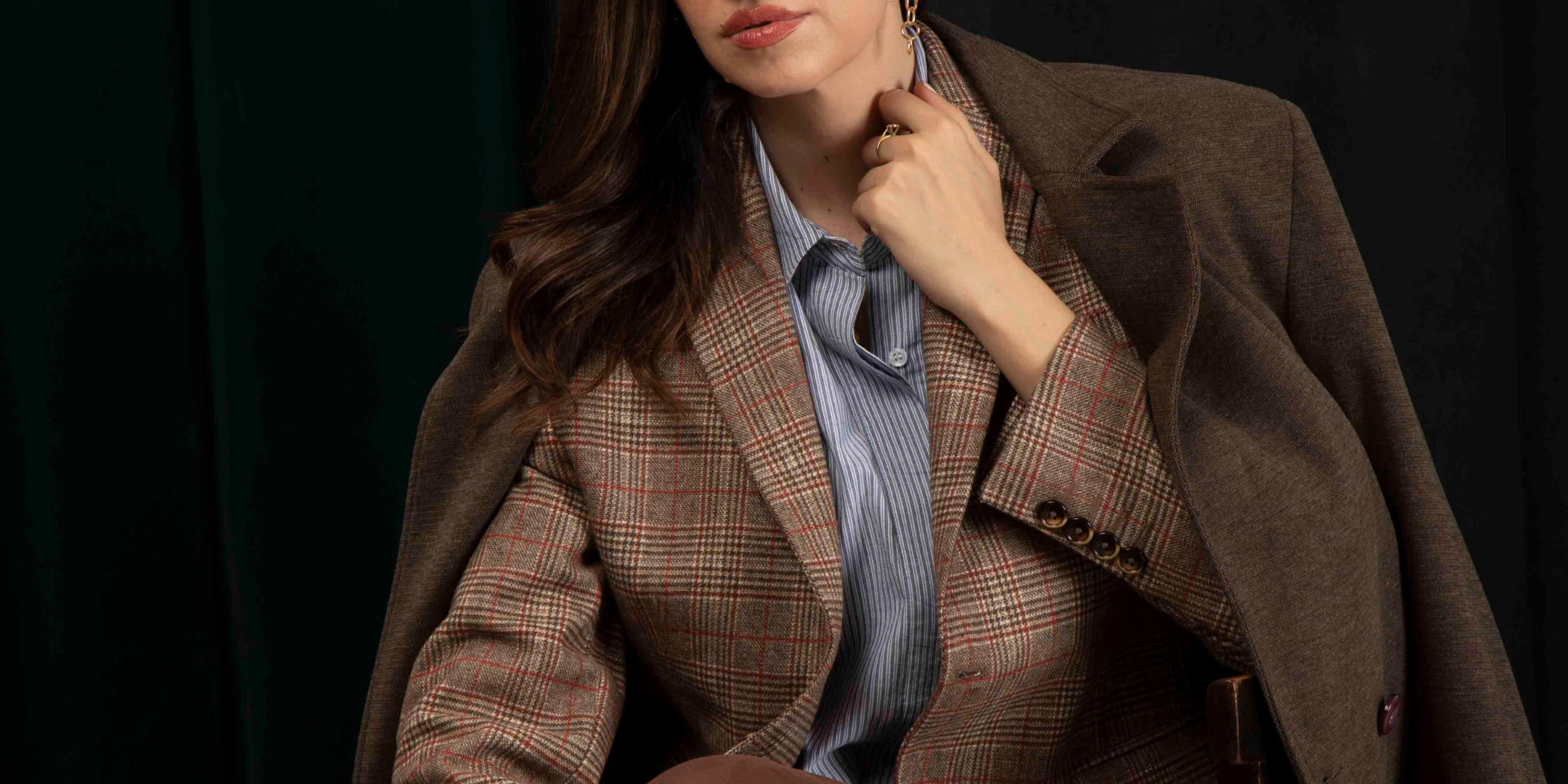 Zeitgeist luxury clothing end of year sale featuring premium coats and formal wear at 50 percent off.