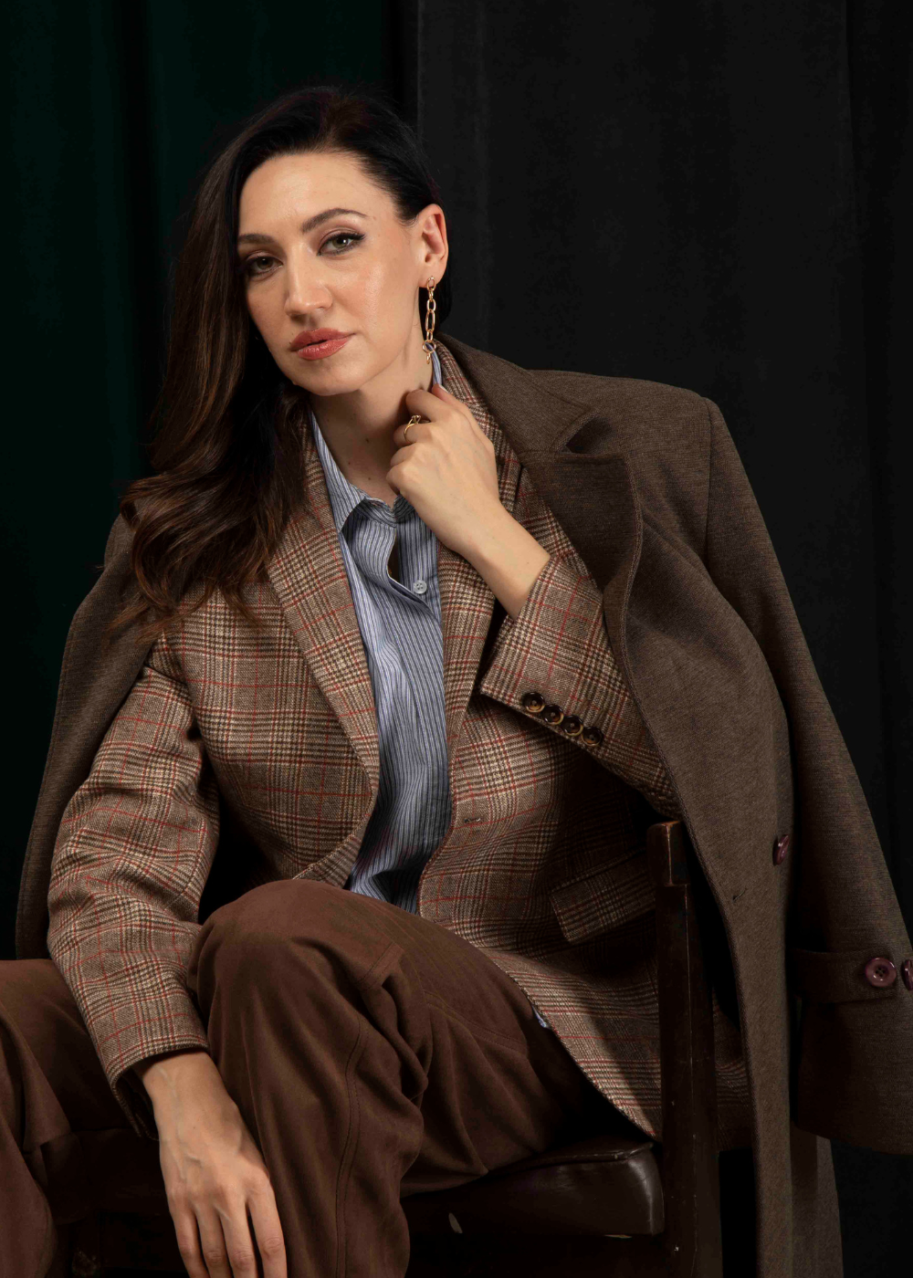 Zeitgeist luxury clothing end of year sale featuring premium coats and formal wear at 50 percent off.